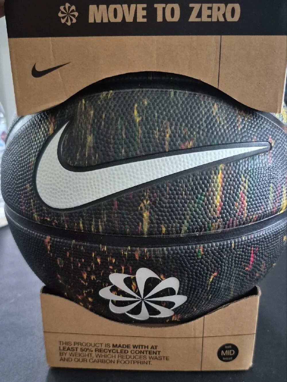Nike Black Basketball with White Swoosh and Multicolor Specks